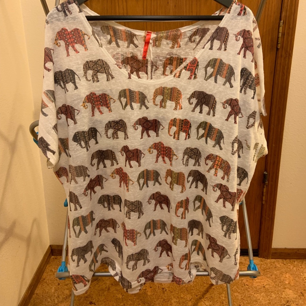 Cream colored lightweight sweater with elephants